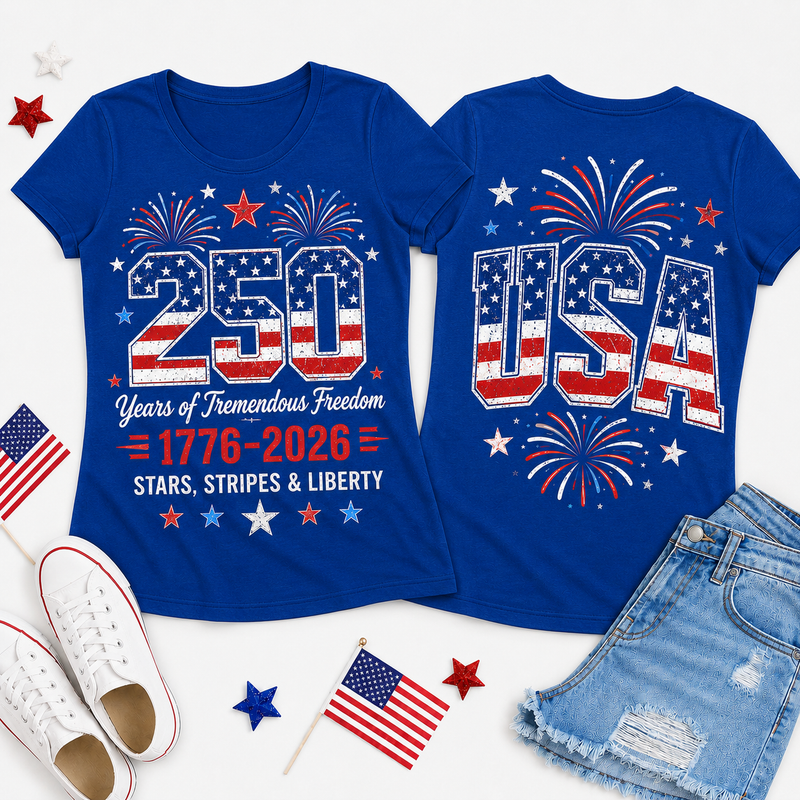 Blue t-shirt with American-themed design featuring '250 Years of Tremendous Freedom' text, surrounded by flags and shoes on a white background.